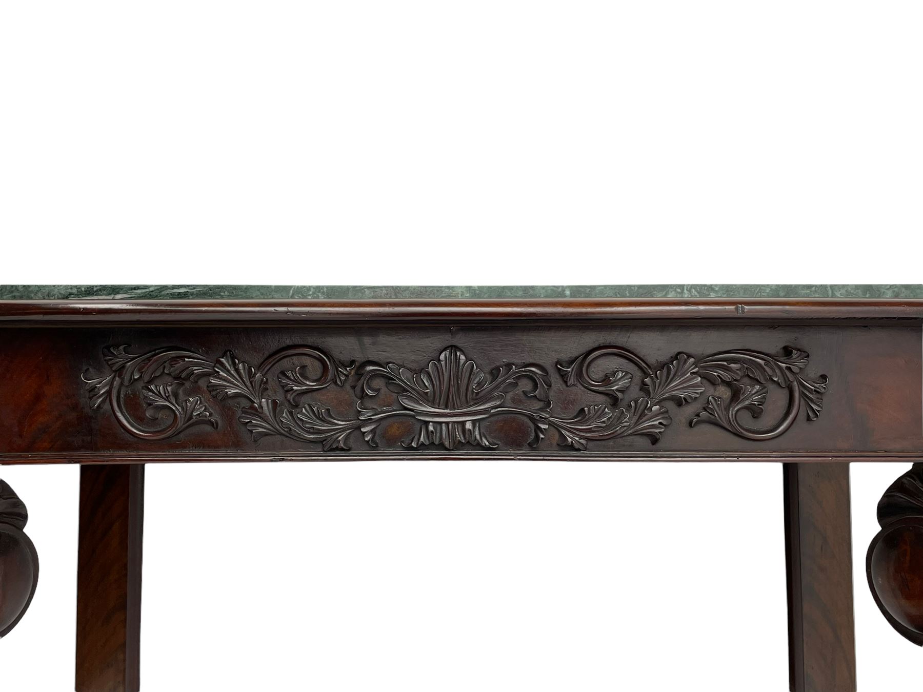 19th century Irish mahogany console table, with green canted marble top and figured frieze with carved scrolled foliage mount, acanthus carved cabriole supports with claw feet and shaped moulded plinth