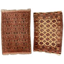Old Afghan red ground rug, decorated with repeating bird motifs, the guarded border with candelabra pattern (150cm x 104cm); and antique Afghan burnt orange ground rug, field decorated with octagonal lozenges, repeating geometric border (134cm x 95cm) (2)