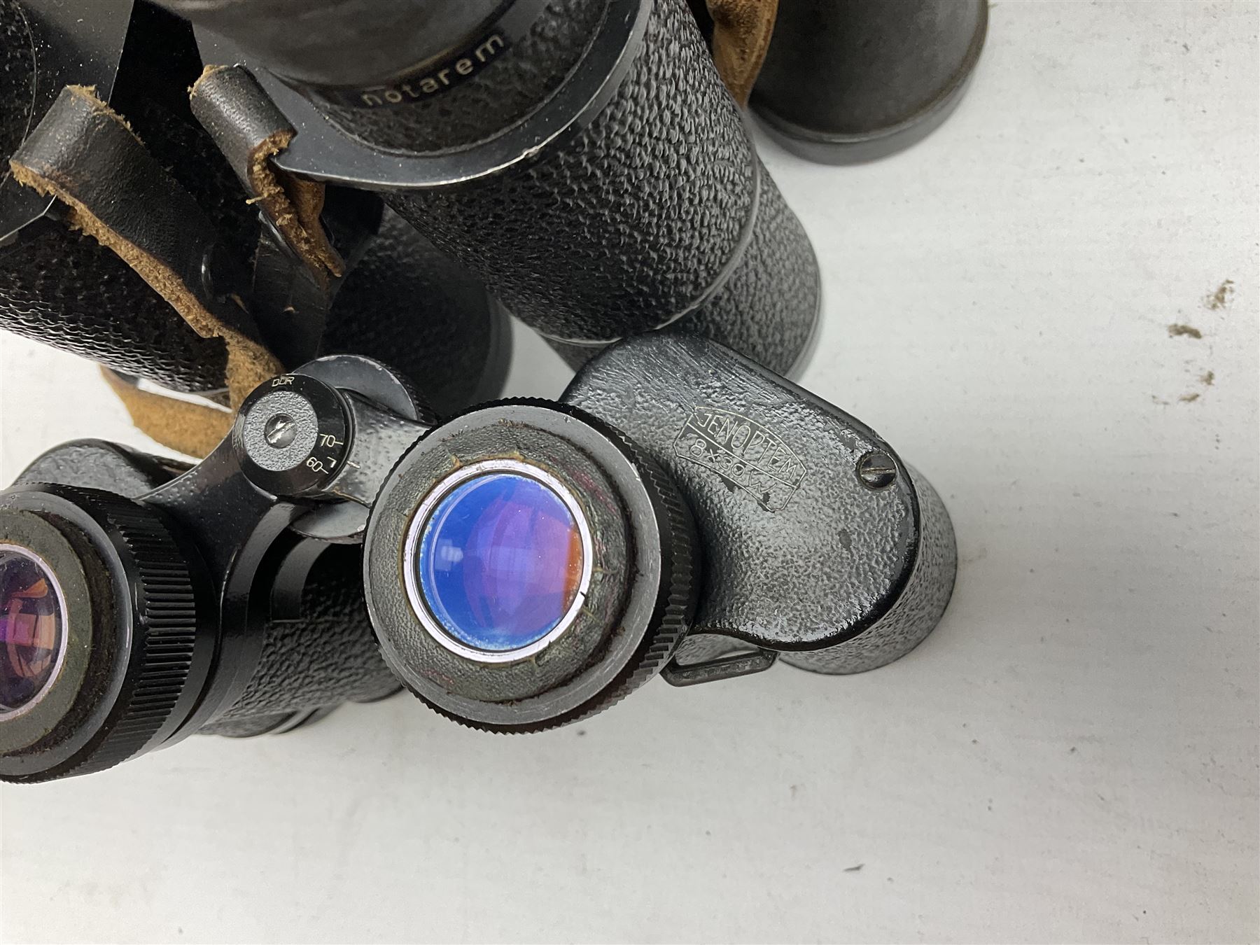 Twelve pairs of binoculars to include BWCF 7x35 Extra Wide Angle, Carl Zeiss Jena Delturis 8x24, Carl Zeiss Jena Jenoptem 8x30W, Chinon Countryman 10x50,  Ajax 8x30, Regent 16x50, etc,  some with cases