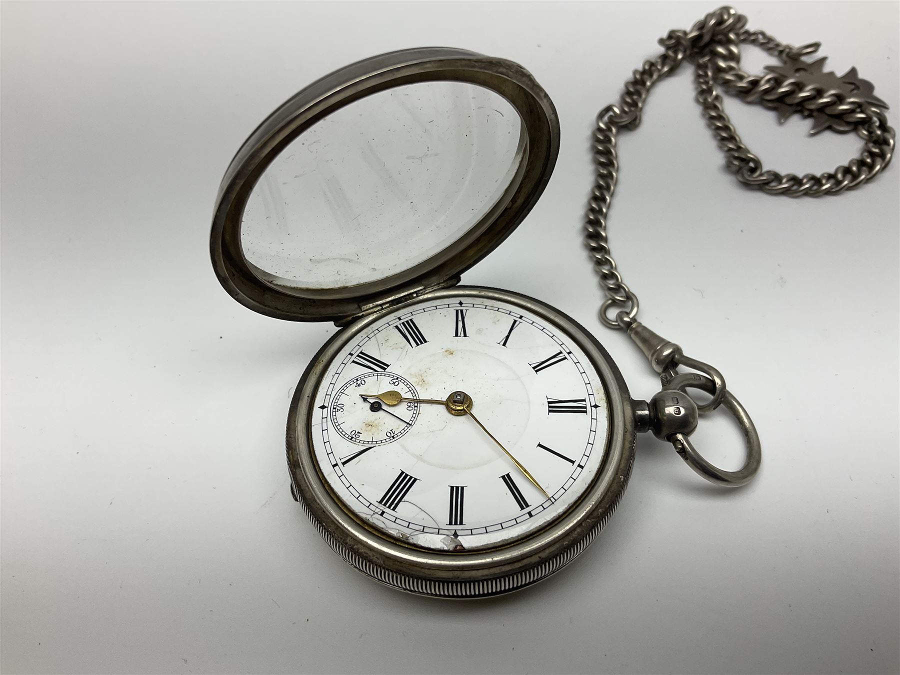 Edwardian silver open face lever pocket watch, case by Alfred Wigley, Birmingham 1901, on silver tapering Albert chain, 14ct gold ladies manual wind wristwatch, two pairs of silver sugar tongs by Francis Higgins II, London 1880, silver charm and a 9ct gold cameo