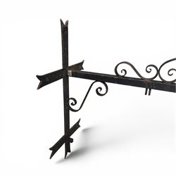Antique wrought iron sign bracket, with strapwork scroll decoration and arrow form support, in weathered black painted finish