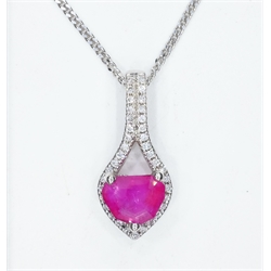  18ct white gold ruby and diamond pendant stamped 750 on silver chain stamped 925,  ruby approx 1.2 carat   