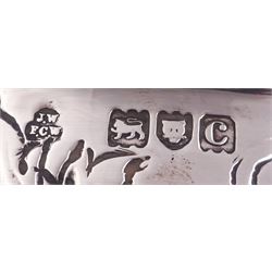 Late Victorian silver rose bowl, of circular form with embossed foliate and C scroll decoration, and engraved personal dedication, upon a part fluted spreading circular foot, hallmarked Wakely & Wheeler, London 1898, H11.5cm D18cm, approximate weight 11.67 ozt (363.2 grams)