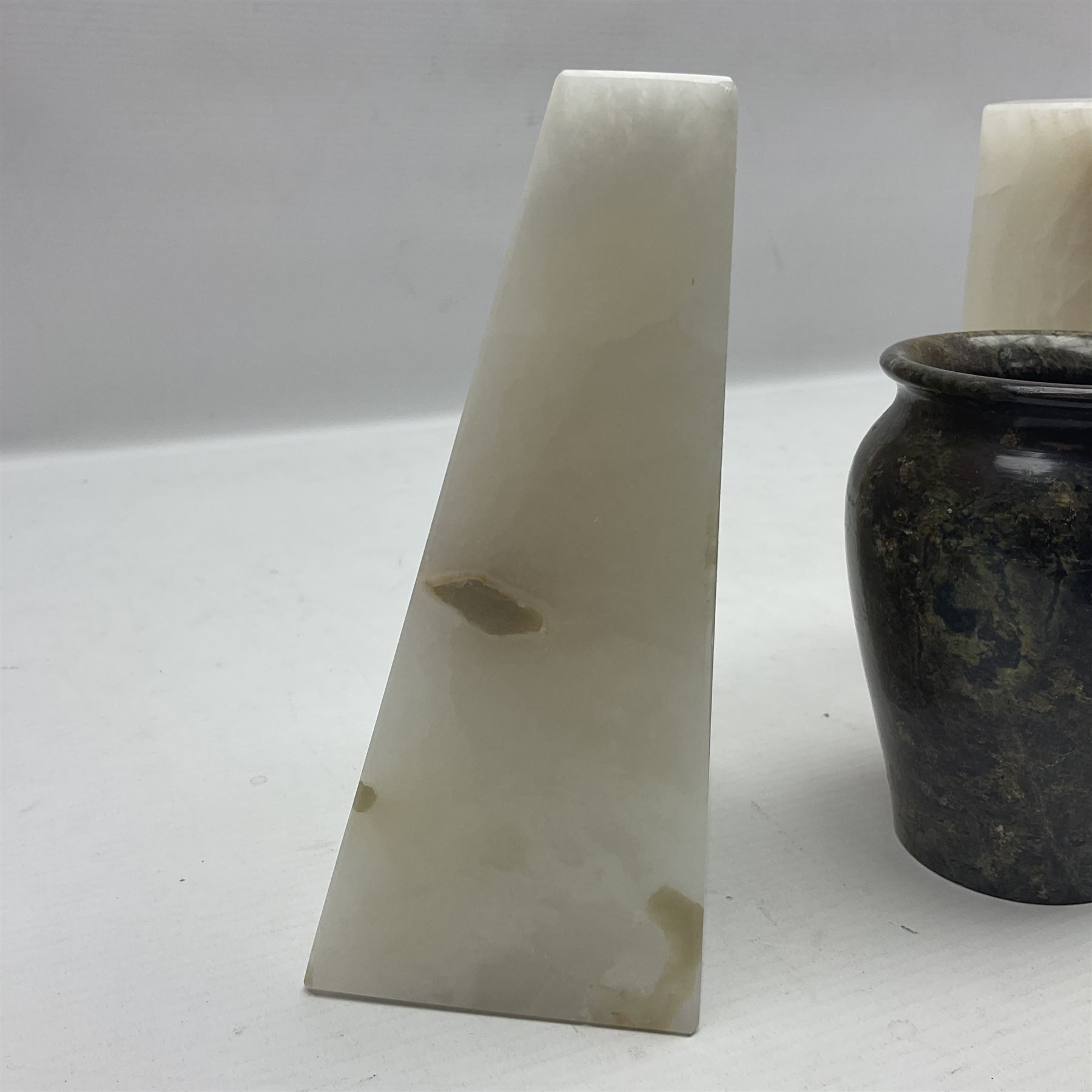 Alabaster bookends, together with marble vase 
