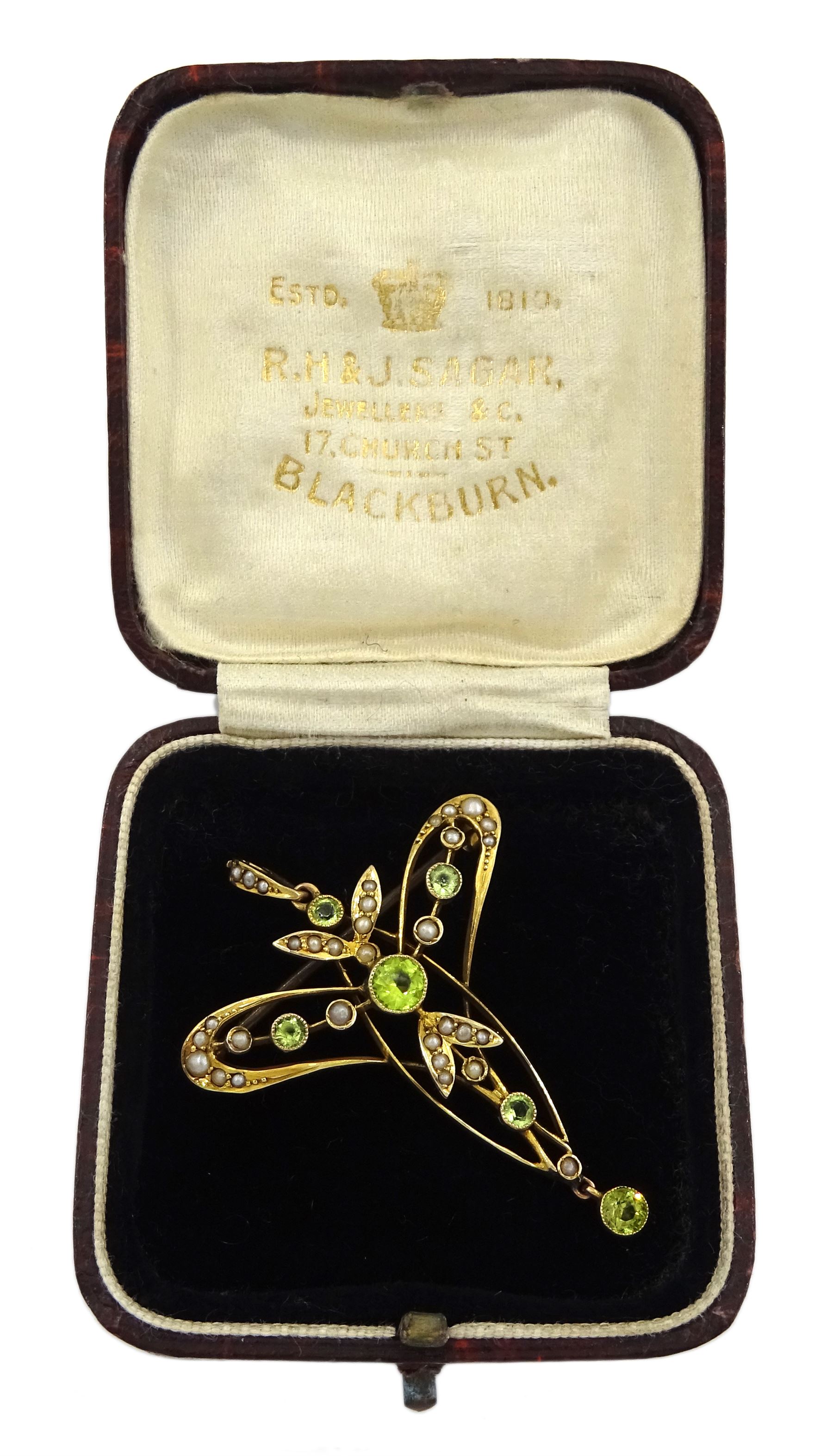 Edwardian Art Nouveau gold peridot and seed pearl pendant/brooch, stamped 9ct, boxed
