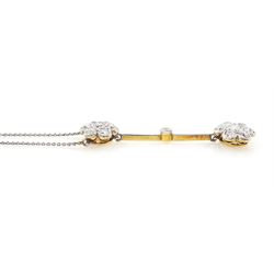 Early 20th century 18ct gold and platinum, milgrain set, old cut diamond double flower head cluster pendant necklace, total diamond weight approx 1.20 carat
