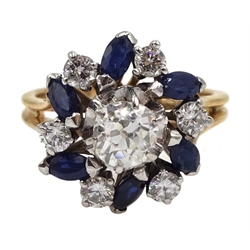 18ct gold diamond and sapphire ring, the central old cut diamond of approx 0.75 carat, with round brilliant cut diamonds and marquise cut sapphires