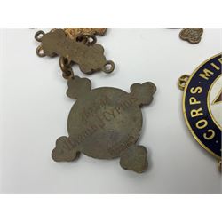 Collection of St John Ambulance enamel and metal badges, together with Red Cross medals and badges