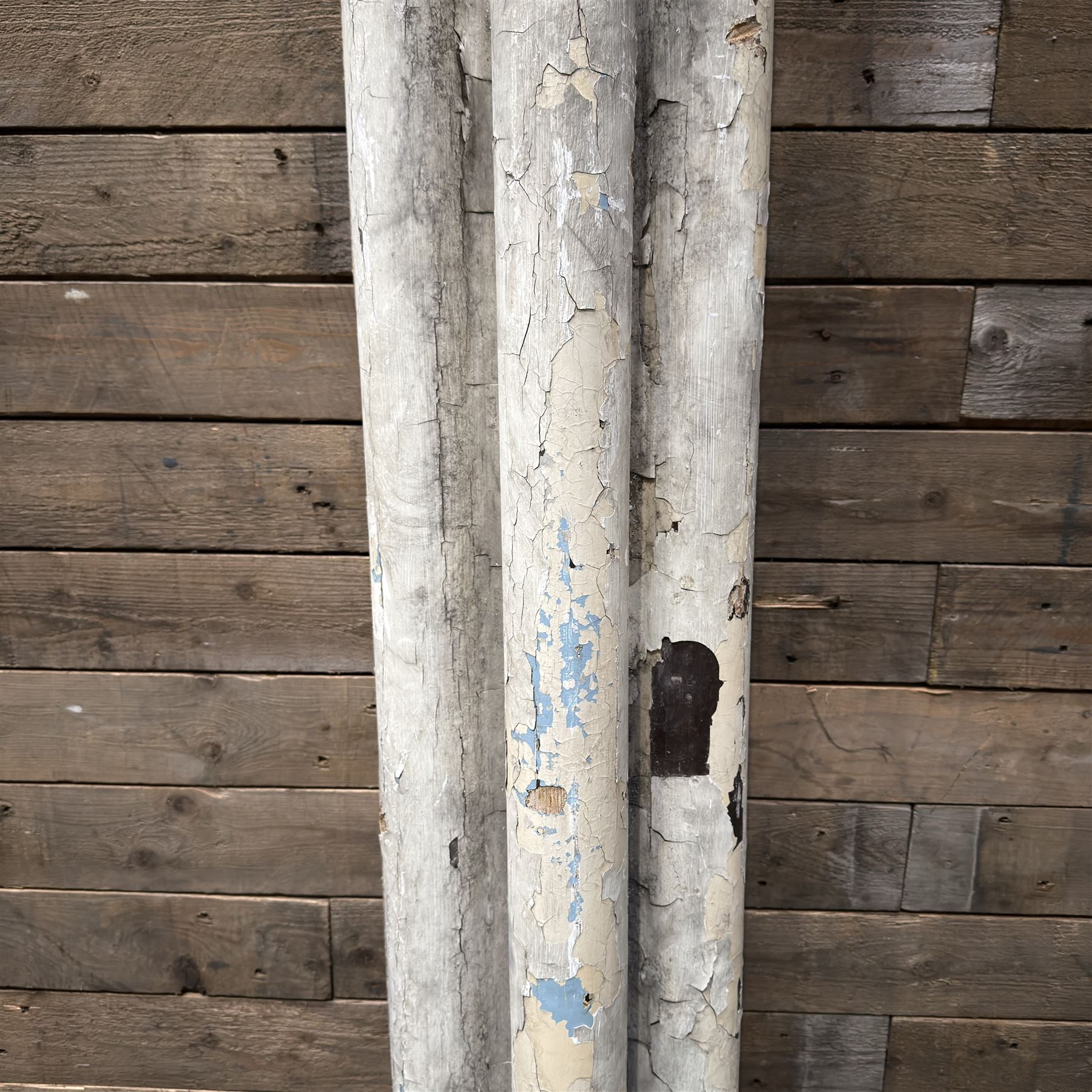 Large 19th century painted pine club shaped column, carved capitals with a cluster of three circular supports, flat back