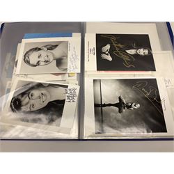 Two folders of over fifty photographs, cards, compliment slips etc of actors, actresses, celebrities, politicians, sports personalities etc, all bearing signatures, including David Frost, Lloyd Grosman, John Suchet, Julia Somerville and othe GMTV presenters, Carol Vorderman, Jackie Collins, Rolf Harris, Timothy Dalton, Pete Postlethwaite, Magnus magnusson, John Major, Kate Moss, Uri Geller, David Beckham, Peter Alliss, Sharon Davies, Kevin Keegan etc