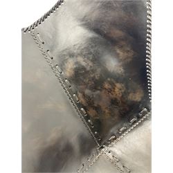 Metal framed butterfly chair upholstered in slung dark tan stitched leather 