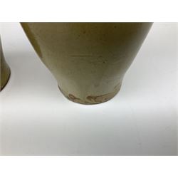  19th century salt glazed stoneware gin bottle impressed John Shaw, Red Lion Vaults, Whitefriargate, Hull of bulbous oval form H27cm and another with impressed label for J. Christie Mytongate Hull (2)  