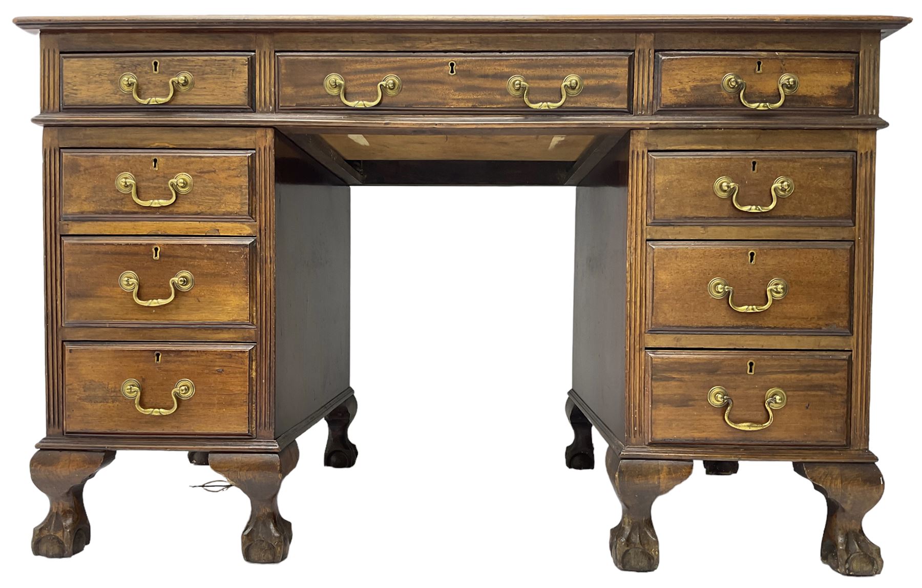Early 20th century mahogany twin pedestal desk, fitted with nine drawers, on ball and claw carved cabriole feet