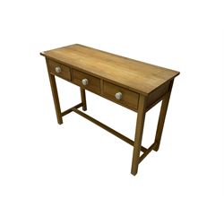 Light oak side table, fitted with three drawers, and ceramic handles