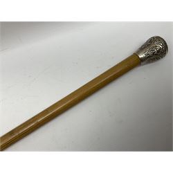 Malacca walking cane, with domed Burmese silver pommel embossed with deities, L91.5cm