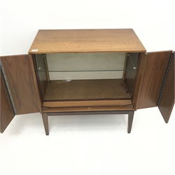  Mid century teak cabinet, two bi-fold doors enclosing single shelf on stand, W78cm, H83cm, D42cm  