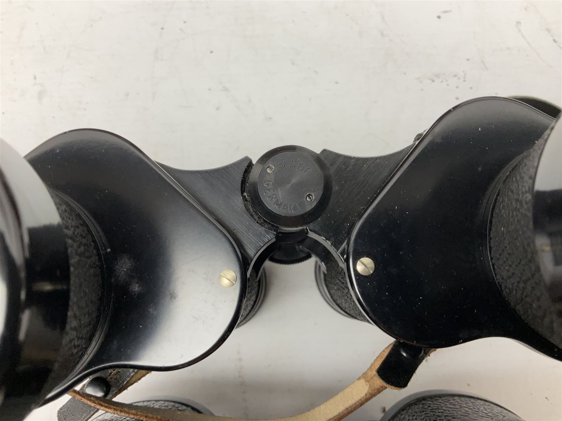 Nine cased pairs of binoculars, to include Tohyoh 22x70, Greenkat 7x- 12x50, Chinon, Fisher-Dietz 7x50, etc