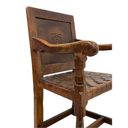 Mouseman - circa. 1930s set of six (4+2) oak dining chairs, panelled back carved with the Bagshawe family crest, the moto 'Forma Flos Fama Flatus' over an arm grasping a bugle-horn with ribbon tie and Yorkshire rose motif, adzed frame, leather lattice strap seat, on octagonal supports united by stretchers, two carvers and four side chairs, each carved with mouse signature, by Robert Thompson of Kilburn 

Provenance: Owned since manufacture by the Bagshawe family, descendants of the Staithes Group Artist Joseph Richard Bagshawe RBA (1870-1909).