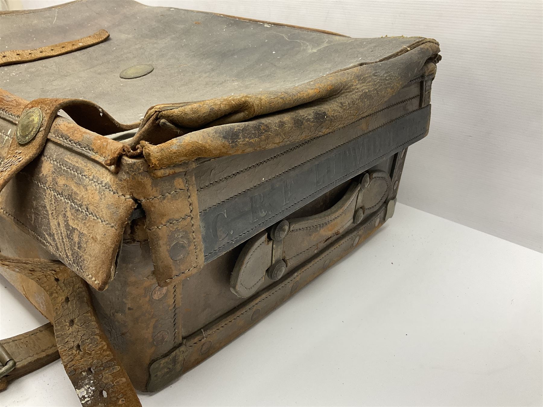 19th century leather suitcase, with brass plaque to cover engraved 'C R F Lutwidge Esq', the pink silk and white kid leather interior with pouch and edging impressed with gilt lettering reading 'By Appointment of Prince of Wales J W Allen 37 Strand Maker Prize Medal Awarded', H21cm, W73cm, Notes: Charles R. Fletcher Lutwidge, was mayor of Tunbridge Wells between 1895-1898, and again between 1901-1902