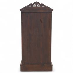 Pair of tall Victorian mahogany bedside chests, of narrow upright form, rectangular top with moulded edge, the back with raised pierced fretwork gallery, above four graduated drawers with knob handles, raised on a plinth base 