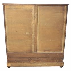 Victorian Scottish mahogany chest, cushion drawer over assorted small drawers and three long drawers, all with flame veneered fronts, turned wooden handles