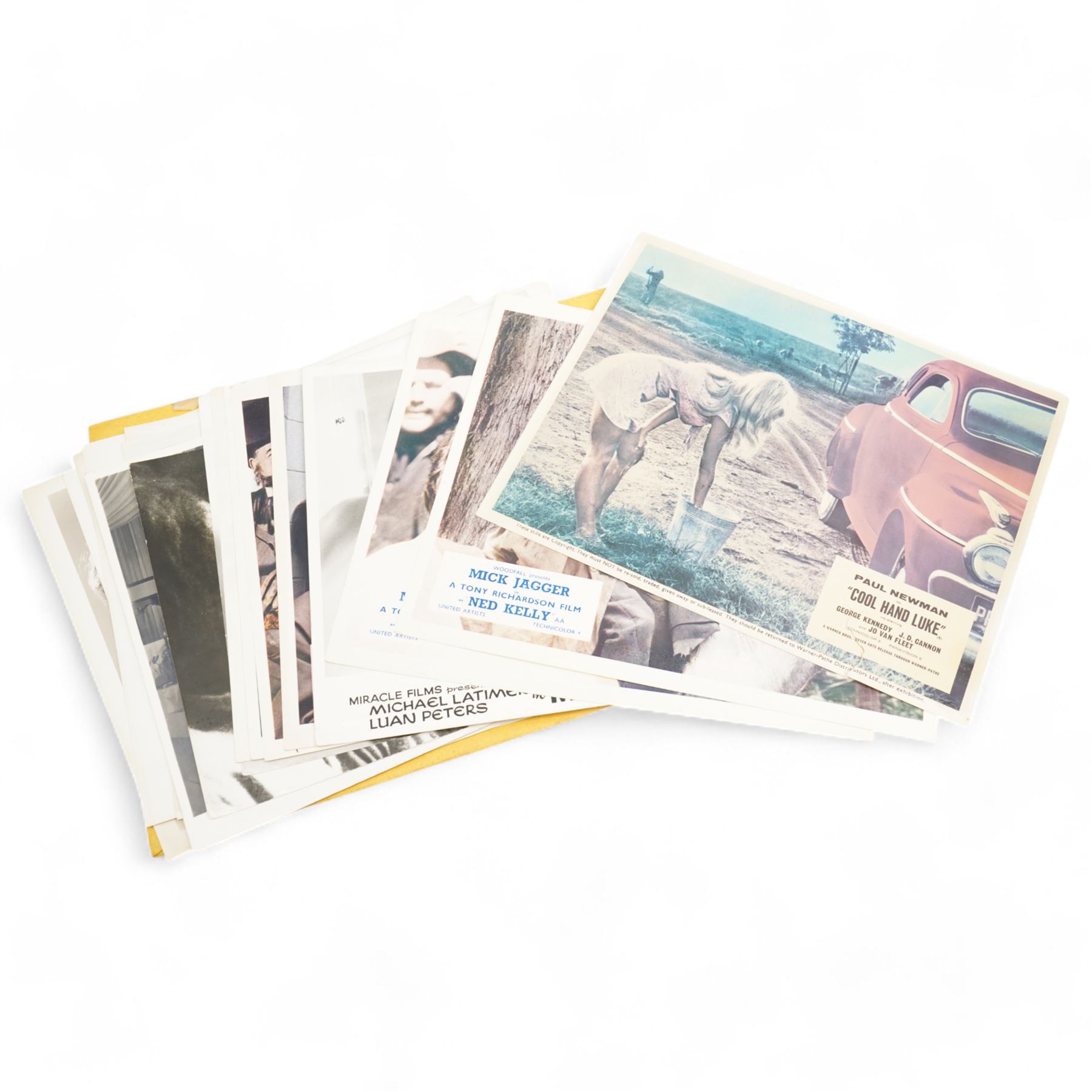 Collection of lobby cards, to include films 'Midnight Cowboy' 'Ned Kelly' and 'Man of Violence' etc, one framed example (approx. 20)