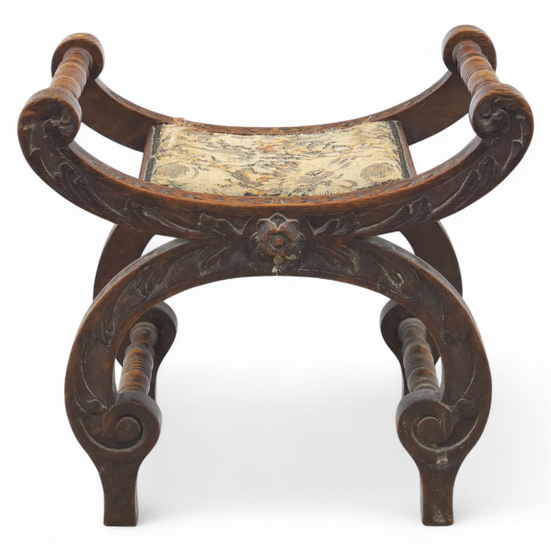 Late 19th century carved oak X-frame stool with tapestry seat
