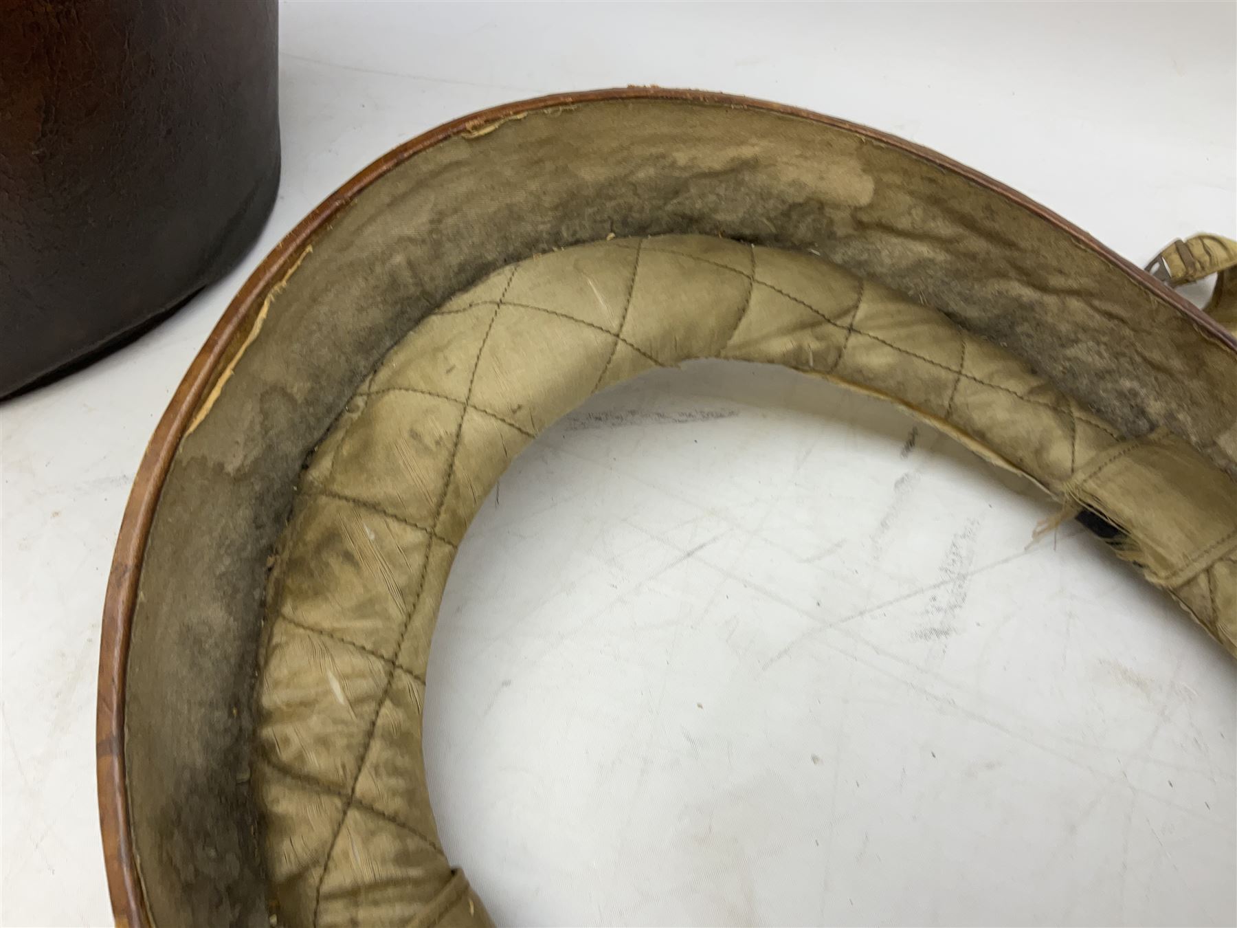 Early 20th century black silk top hat by Woodrow of Manchester and London, with manufacturer's stamp to the silk lined interior, housed in fitted tan leather hat box with removable internal compartments with straps, brass escutcheon and engraved plaque, hat internal measurements approx 20cm x 15cm
