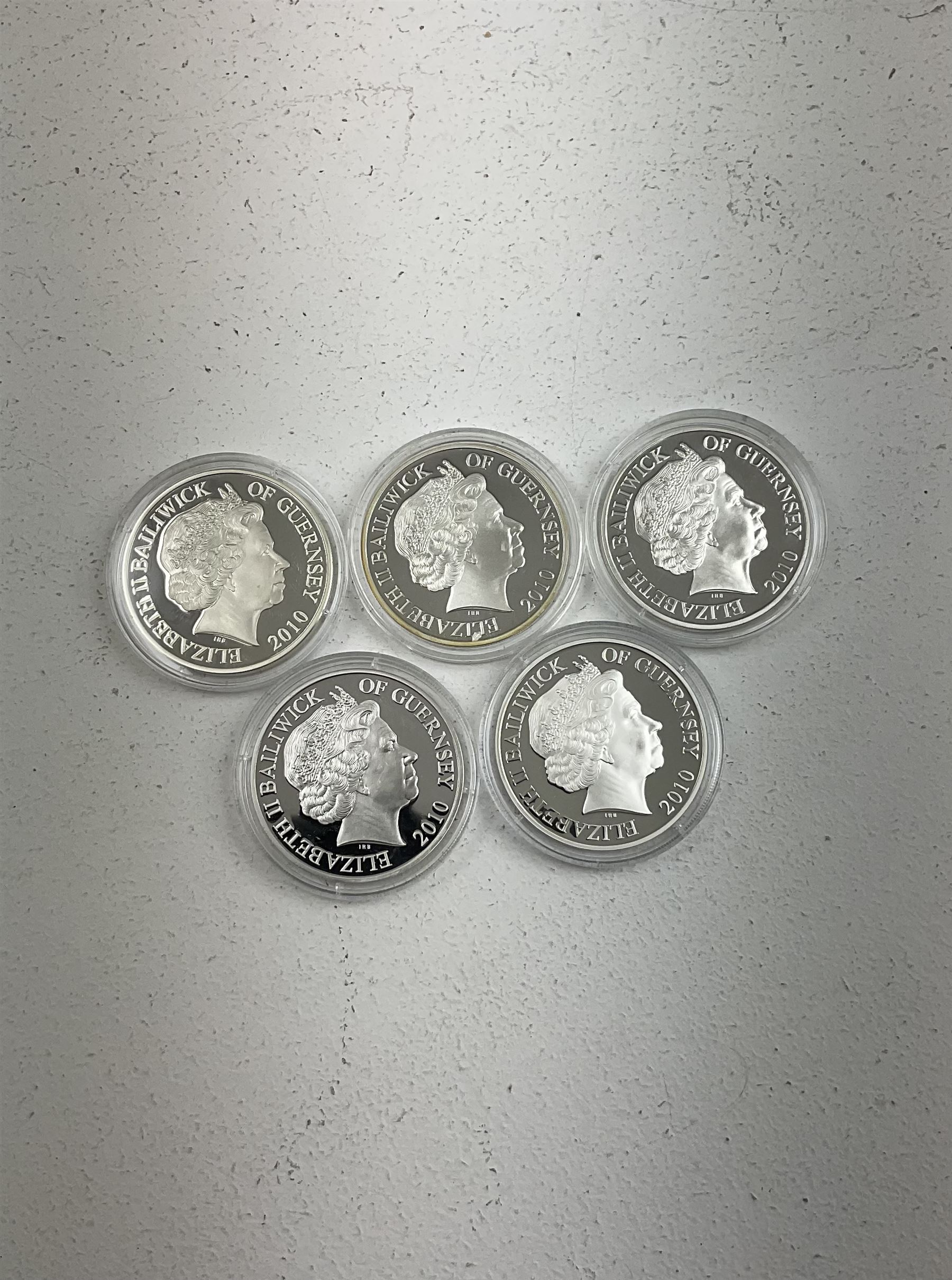 Five Queen Elizabeth II Bailiwick of Guernsey 2010 silver proof five pound coins, from the '70th Anniversary Battle of Britain Silver Coin Collection', some with certificates