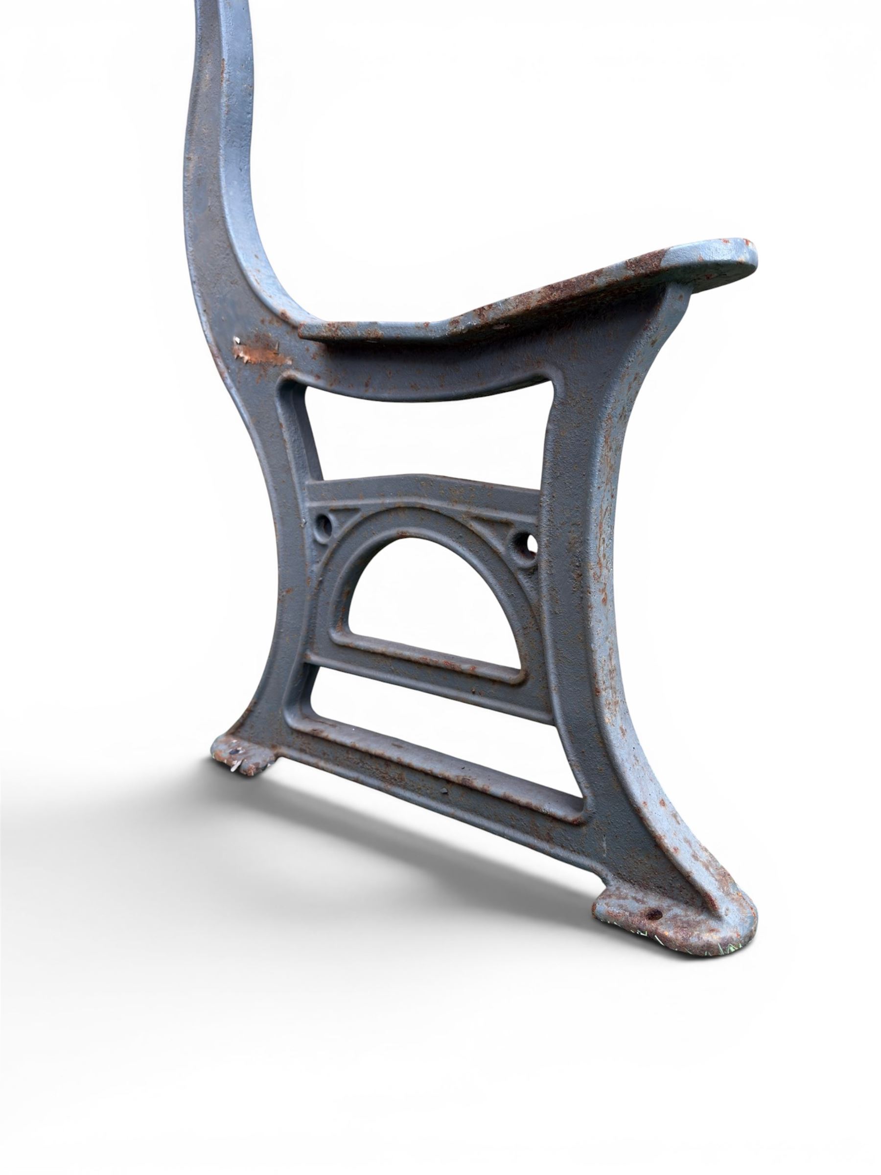 Set of three mid-20th century cast iron towns and park bench ends, scrolling pediment over arched stretchers, length to be altered as desired