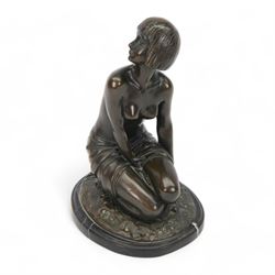Art Deco style bronze study of a kneeling semi-nude female, after  Amadeo Gennarelli with signature to base, upon a black marble effect plinth, H23cm