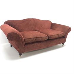 Multi-York three seat sofa, upholstered in a maroon fabric, shaped back, scrolling arms, turned supports on castors, W210cm