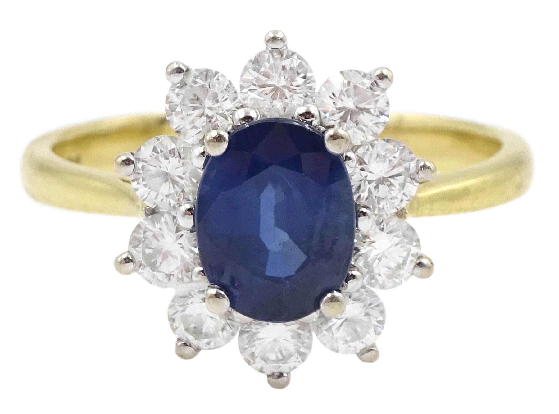 18ct gold oval sapphire and round brilliant cut diamond cluster ring, hallmarked, sapphire approx 1.40 carat, total diamond weight 0.98 carat