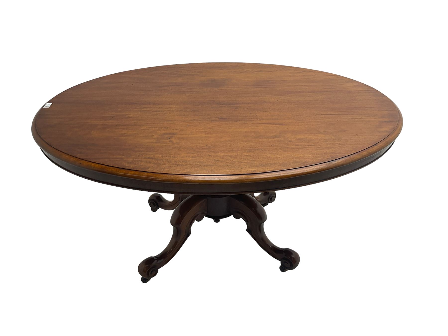 Victorian mahogany oval loo table, moulded edge with banded frieze, raised on baluster turned pedestal with quadrupod base, cabriole supports with scroll feet and castors