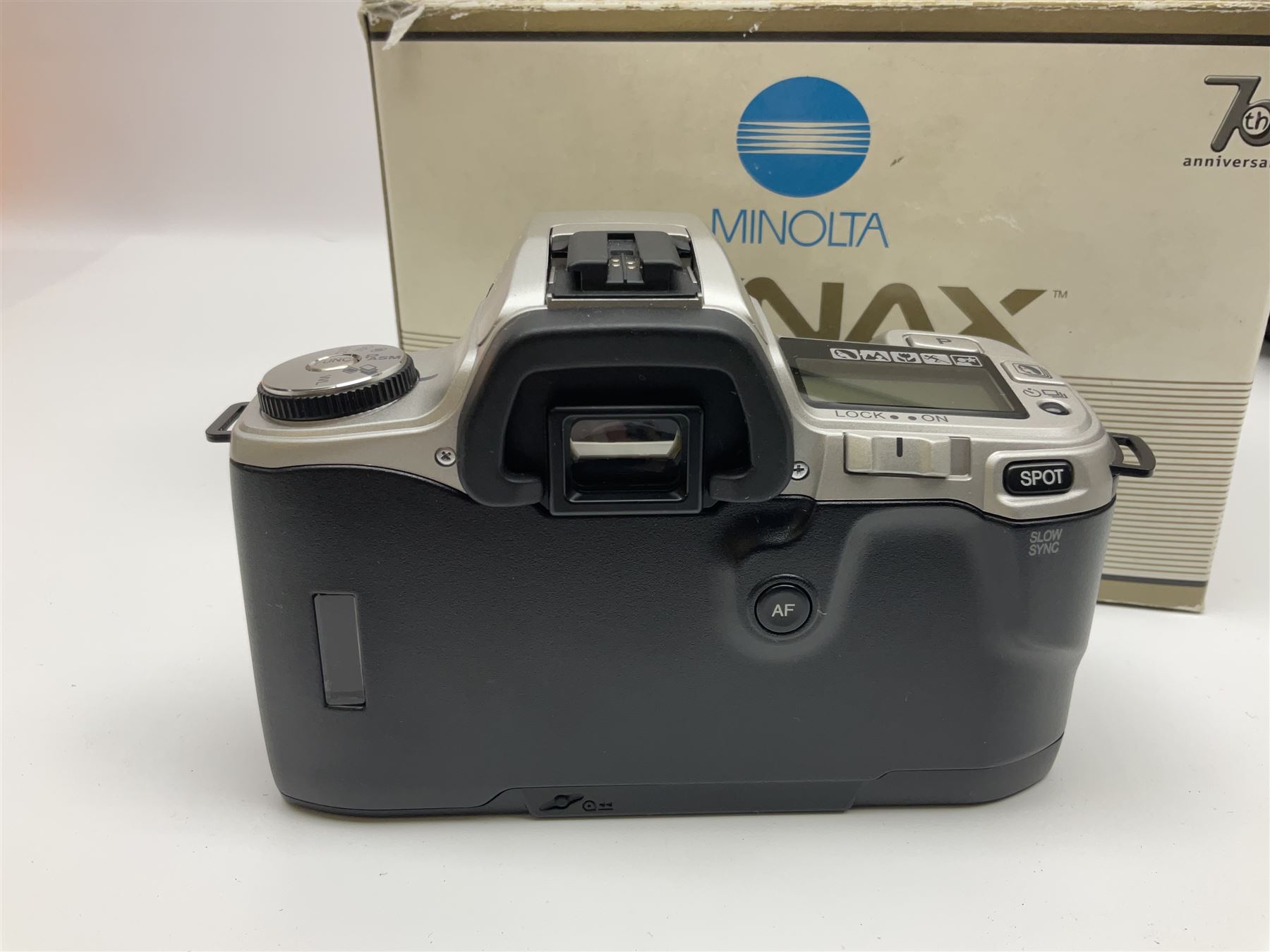 Four Minolta camera bodies, to include Dynax 500si, serial no. 94812651 with 'Signa Zoom 1;3.5-4.5 f=28-70mm' lens, Maxxum 300si, serial no. 97821665, with 'Tamron AF 80-210mm' lens and Dynax 300si, serial no 01603265'  with Minolta AF Power Zoom 35-80mm 1;4' lens, etc, together with Pantax MV1 camera bodies and other camera equipment 