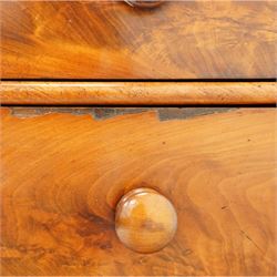 Mid-Victorian figured mahogany chest of drawers, circa 1860, rectangular moulded top over two short and three long drawers with figured veneers, on turned supports