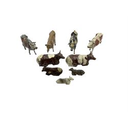 Britains Nestles 'The World's Cow' decorated with map-of-the-world pattern L8cm; and eight other various sized lead figures of cows, standing or reclining, by Britains, Hill & Co etc (9)