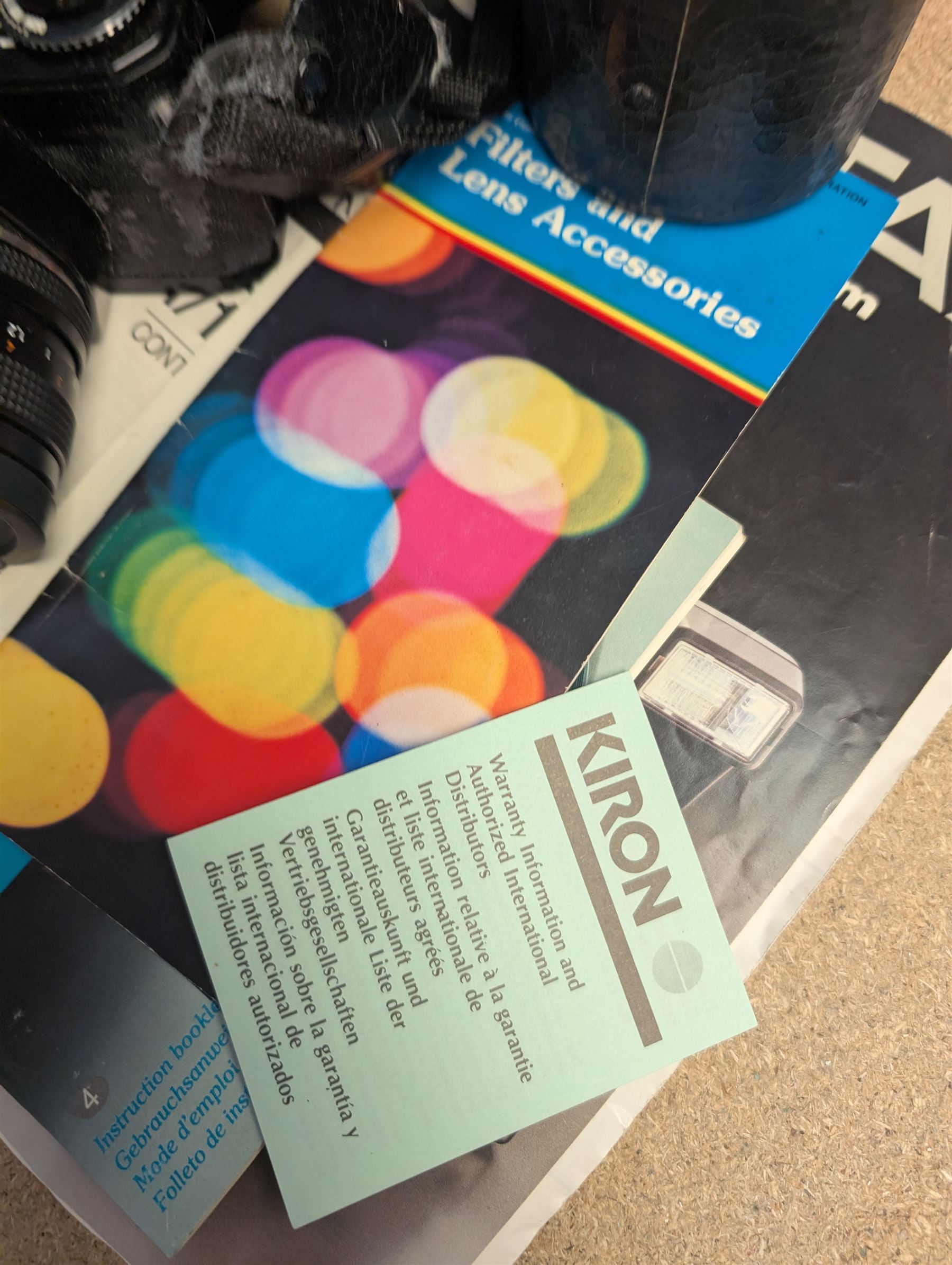 Contax SLR camera with a Yashica ML Zoom 42-75mm 1:3.5-4.5 lens, in case with accessories, together with a Yashica FX-D Quartz SLR camera with a Carl Zeiss Planar 1.7/50 lens, with filters, instruction booklets and other accessories