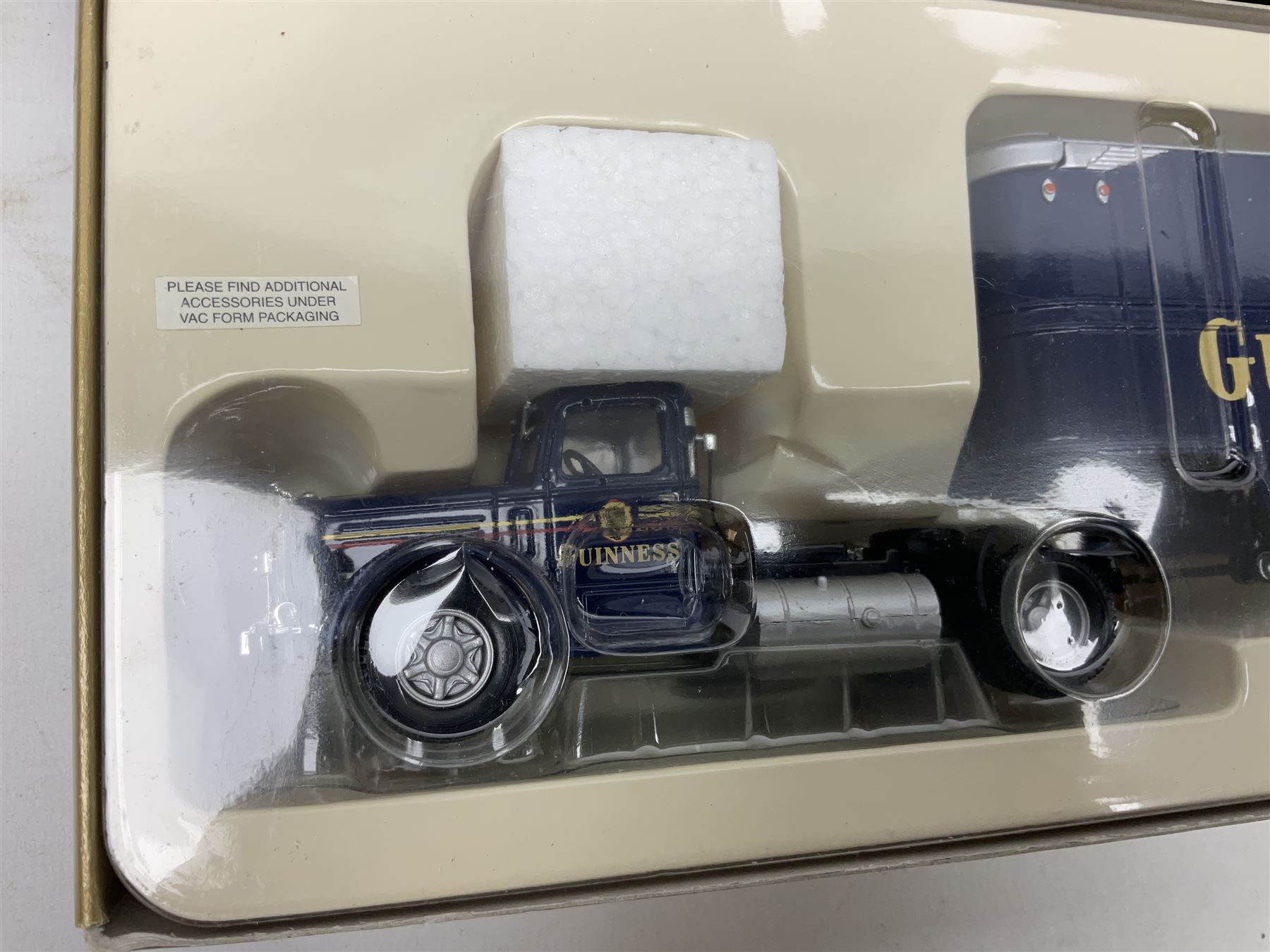 Corgi - three limited edition lorries comprising CC12901 Scania Topline Curtainside Eddie Stobart Limited; CC12104 Renault Premium Curtainside Strongserve Ltd; and 50703 Guinness Mack LJ with Fruehauf Trailer; all boxed (3)