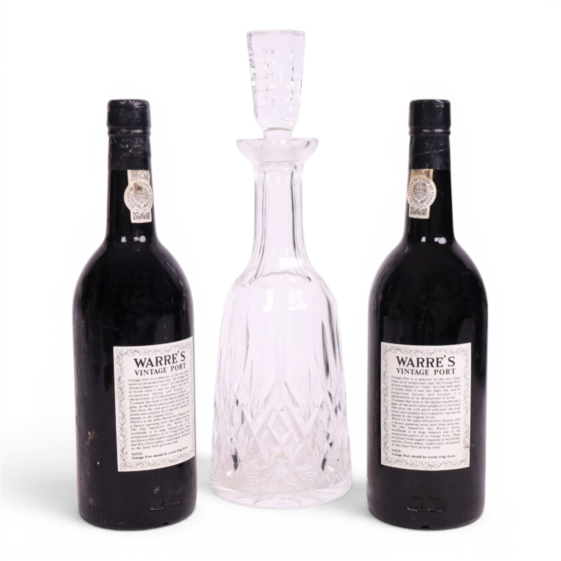 Warre's 1977 vintage port, 75cl unknown proof, two bottles, with Waterford Lismore pattern glass decanter