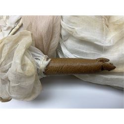 Victorian wax shoulder head doll with pale complexion, applied hair, inset glass eyes and fabric covered jointed body with kid leather lower arms; white linen dress and undergarments H50cm