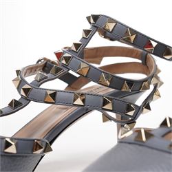 Valentino Garavani - pair of Rockstud grained leather and leather strap stiletto heels in blue, with pointed toes and gold tone pyramid stud detailing to the uppers, size 38, unused with original box and dust bag