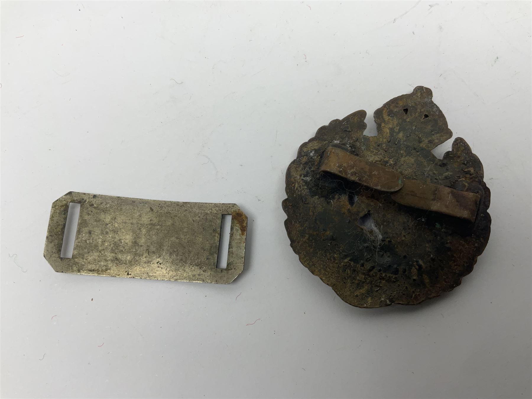 Made-up group of three WWI medals comprising 1914 Star awarded to 23598 Gnr. F. Jefferson R.G.A., British War Medal and Victory Medal with names removed; with ribbons on wearing bar; 1942 Motorist's Medal and small quantity of cap badges, Royalty badges etc