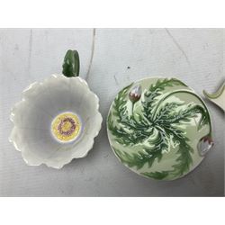 Five Franz teacups and saucers comprising Hummingbird FZ00129, Bluebell FZ00875, Dragonfly FZ00028, Butterfly XP1693 and Daisy FZ00793, together with Hummingbird spoon, all boxed (6)