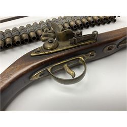 Leather covered swagger/sword stick with 40cm steel blade L62cm overall; another ash sword stick with 30cm diamond section steel blade; pair of fencing foils, the blades marked Solingen; two reproduction flintlock pistols; and 92cm inert cartridge belt (7)