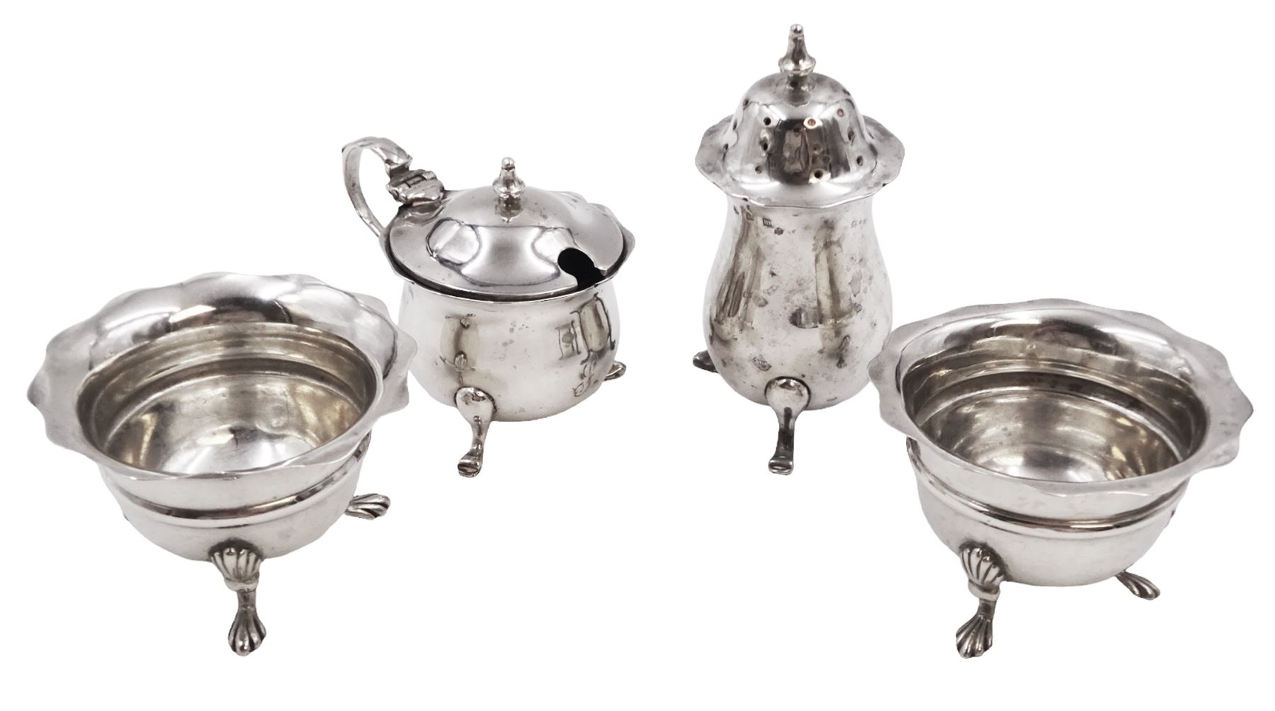 Pair of Victorian silver open salts, of circular form, with girdle and lobed rim, upon three shell mounted pad feet, hallmarked Fenton Brothers Ltd, Birmingham 1900, together with an early 20th century silver mustard pot and cover, of plain circular form, with C scroll handle, shaped rim and engraved initial to body, with knopped finial to slightly domed hinged cover, upon three pad feet, hallmarked Birmingham 1916, maker's mark worn and indistinct, together with a similar silver pepper shaker, hallmarked Birmingham 1911, maker's mark worn and indistinct