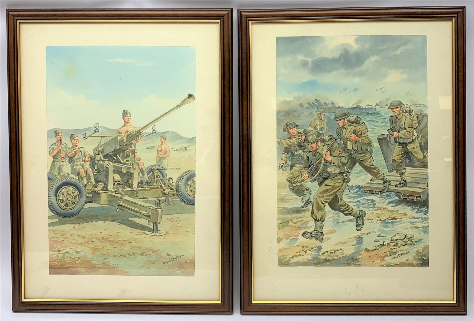 Charles C. Stadden (1919-2002) 'Ack Ack Gun' and 'Normandy Landing', pair of watercolours, signed 43 x 27.5cm, mahogany stained frames NB. Charles C. Stadden was a military sculptor, model maker and artist.
