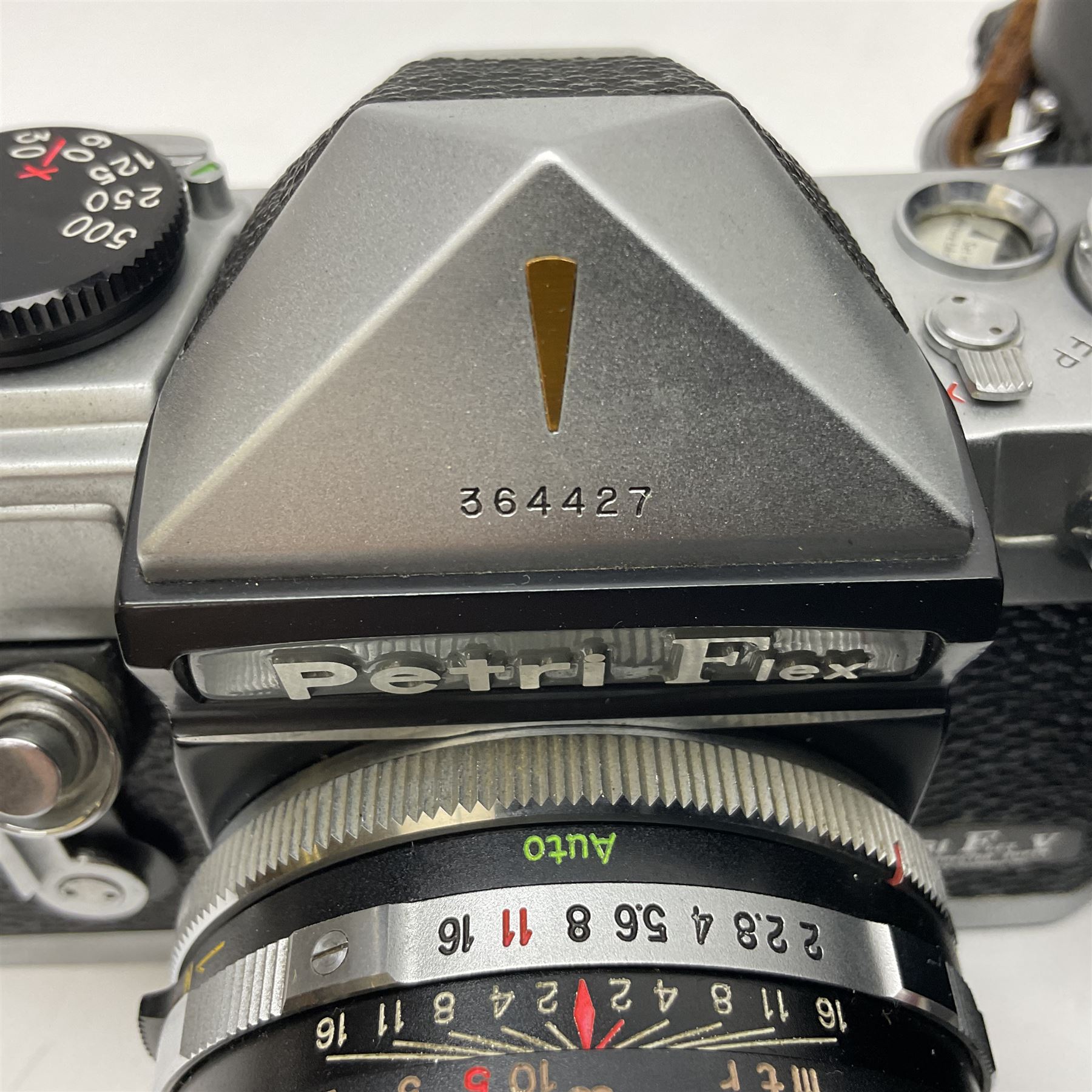 Petri Flex 7 camera body, serial no. 555698, with Perti C.C 1:1.8 f=55mm' lens, serial no. 78253, together with Petri Flex V2 camera body, serial no. 364427, with 'Petti C.C. 1:2 f=55mm' lens, serial no. 137076, in ever ready case