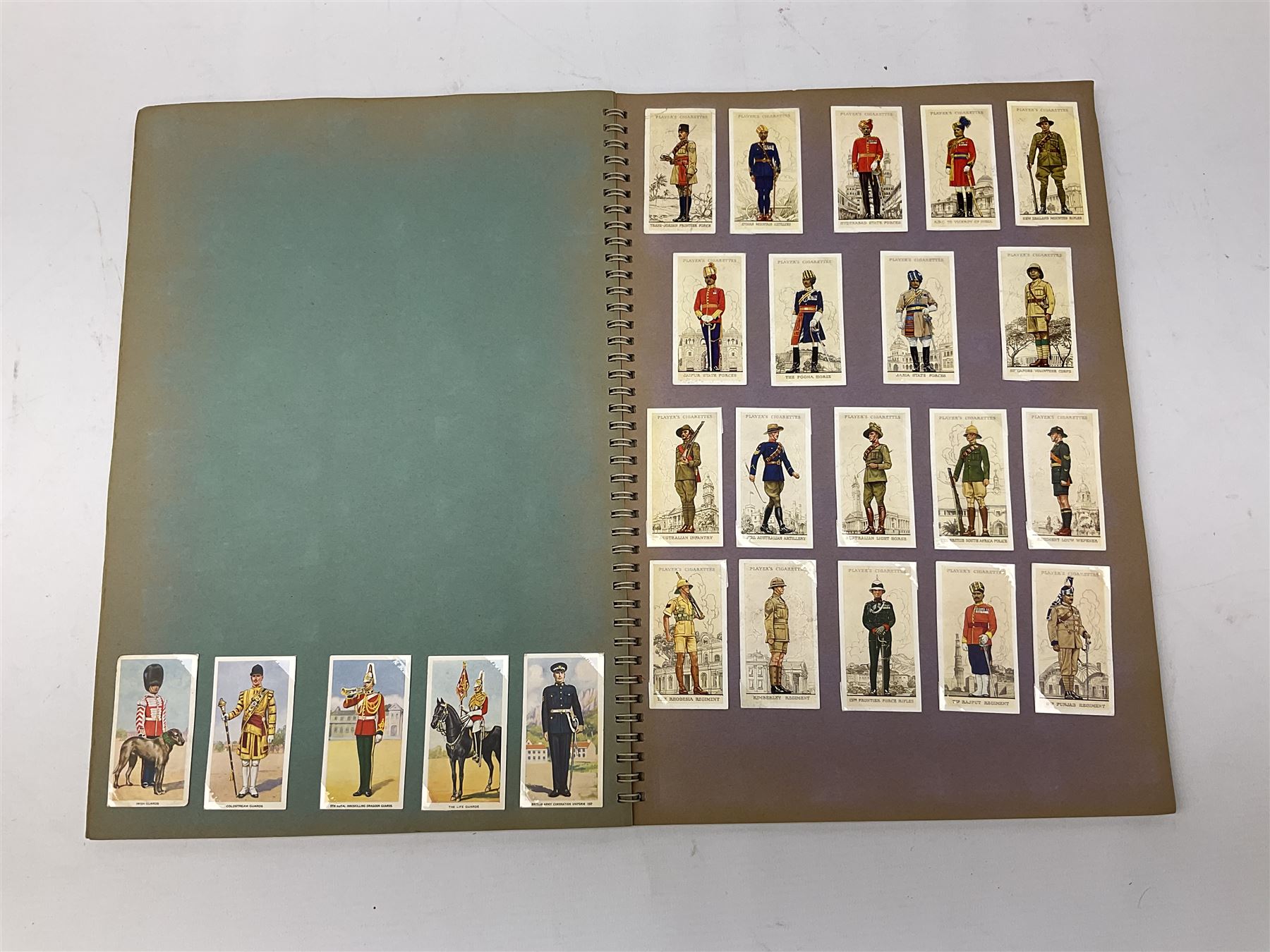 Magnus Laurie: The West Riding Territorials in the Great War. 1920: German Haus Neuerburg cigarette card album entitled Der Bunte Rock depicting 19th century military uniforms; French Chocolat Aiglon trade card album including some military costumes; and a cigarette card album, some of military interest (4)