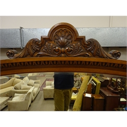  Large Victorian carved oak mirror back sideboard, stepped arched bevelled plate with shell and scroll carved cresting, fluted columns and urn finials, the inverted breakfront mirror waisted base with three reeded drawers and four geometrically moulded doors on a plinth base, stamped Coates, W229cm, H263cm, D68cm  